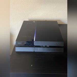 Normal Playstation 4, good condition works perfectly fine